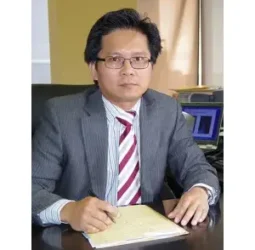 Dr. Tiew Han